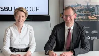 Amanda Pritchard and Paul Kett sign the Memorandum of Understanding 