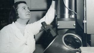 June Almeida at microscope