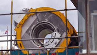MRI scanner being lifted by crane