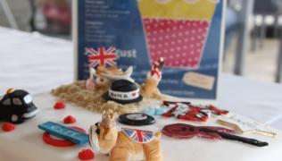 British themed cake with great bake off poster in the background