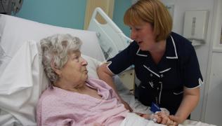 Ward Sister Andrea Handley with a patient