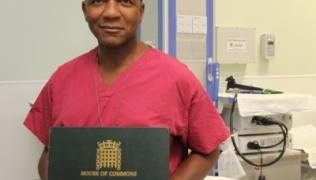 Gastroenterologist is first doctor to sign autograph book for Mandela