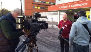 Staff being interviewed outside A&E