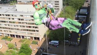 A participant taking part in last year's abseil dressed as the Hulk