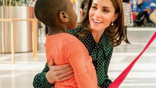 Duchess of Cambridge with arm round boy on GiST magazine frontcover
