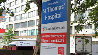 A welcome sign for St Thomas' and Evelina hospital, including 24 hour Emergency department  