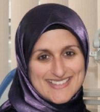Sarra Jawad is a woman wearing a purple headscarf