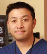 Headshot of Dr Eric Woo, consultant radiologist