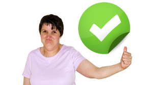 A woman gives a thumbs-up next to a green tick symbol to say yes