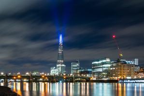 The Shard lit up blue in tribute to the NHS, next to Guy's Hospital