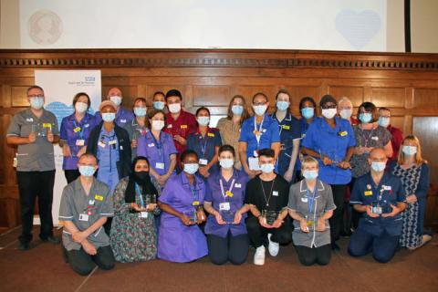 Nurses and midwives in a group with their awards