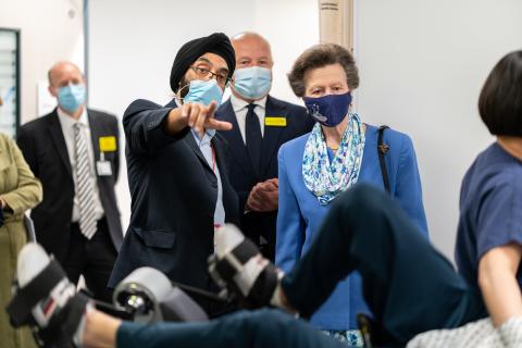 The Princess Royal watches a demonstration of the stationary bike in the stress echocardiography room