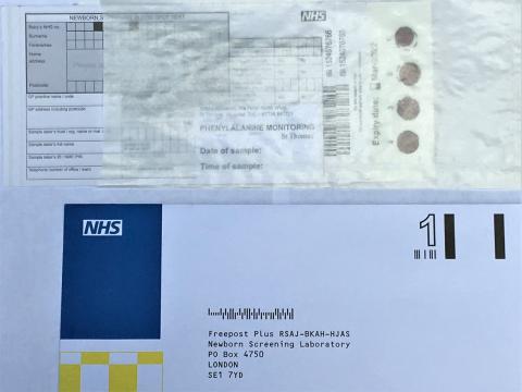 Photo of a blood spot card being put into a plastic sleeve (with the blood spot end first) and a pre-paid envelope