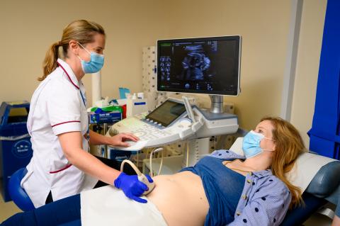 Sonographer doing ultrasound scan