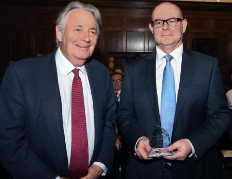 Photo shows Dr Paul Weldon, principal clinical psychologist at Royal Brompton Hospital, with Charles Alexander at the CARE awards