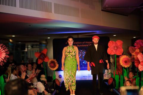 Mason Morgan (right) and a fellow model in the Cancer Survivors' Day fashion show