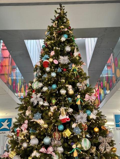 Christmas Tree at Evelina London decorated with toys. 