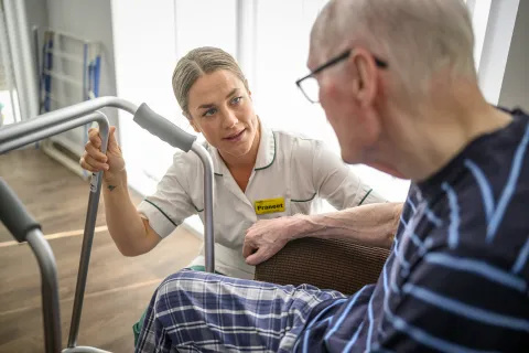 Community occupational therapist with patient