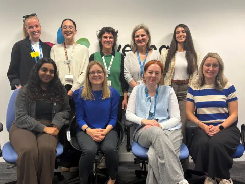9 members of the CHILDS team, sitting down