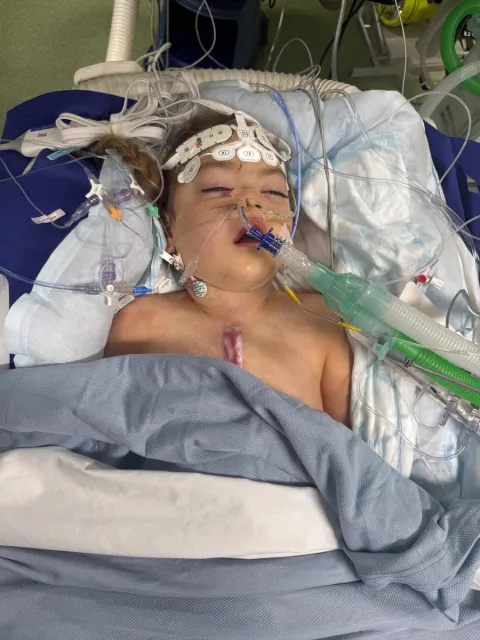 Paisley Rose lying in a bed in Evelina London Children's Hospital