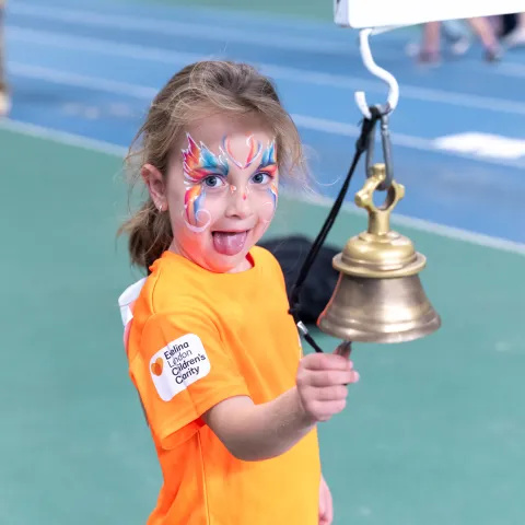 Evelina London transplant patient rings bell at Transplant Games.