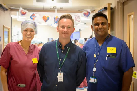 Clair Mullins, cath labs manager, and Sumesh Thiruthalil, with Harefield’s councillor, Tommy Balaam