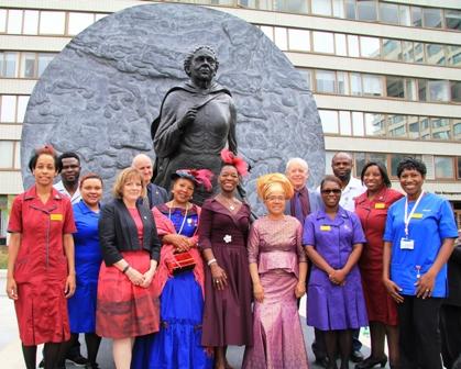 Nurses standing in front of Mary Seacole statue