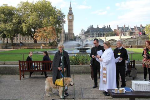 Rev Mia Hilborn performs blessing for care and emergency service animals
