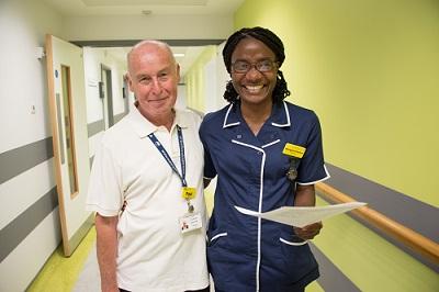 Ward sister and porter in outpatients department