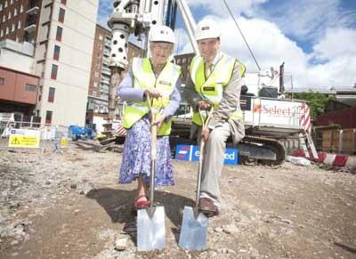 Diana Crawshaw, Chair of the Patient Reference Group, breaks the ground for the new Cancer Centre at Guy’s with Simon Hughes MP in July 2013