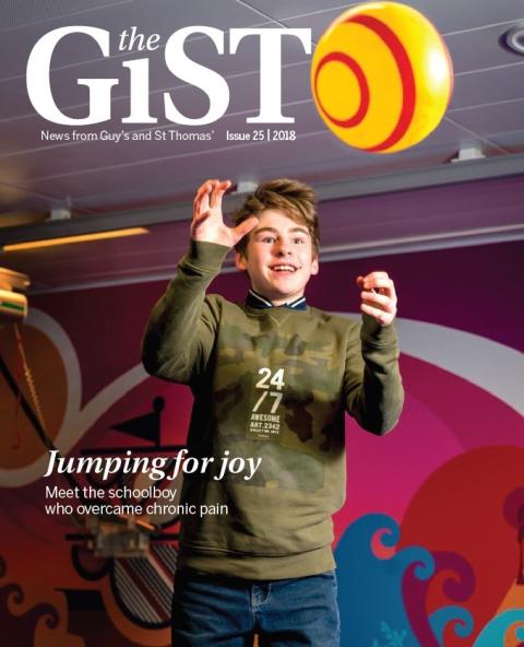 Boy looking at yellow ball. The GiST magazine front cover, issue 25
